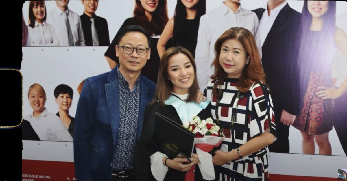Naomi Neo and her parents during her graduation ceremony