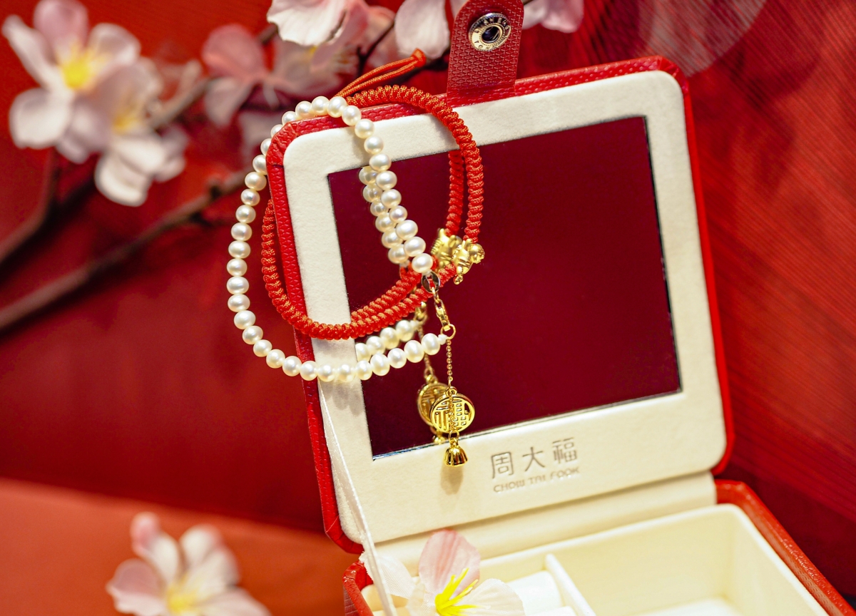 CHOW TAI FOOK ‘Token of Friendship’ Collection Pearl Bracelet with 999 Pure Gold Charm, $490. CHOW TAI FOOK 999 Pure Gold Charm with Adjustable Bracelet, $150. 