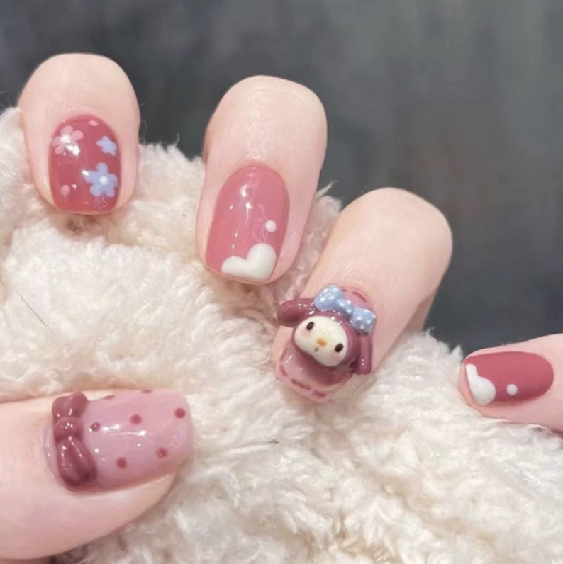 Pink nails with 3D My Melody charm and polka dot prints