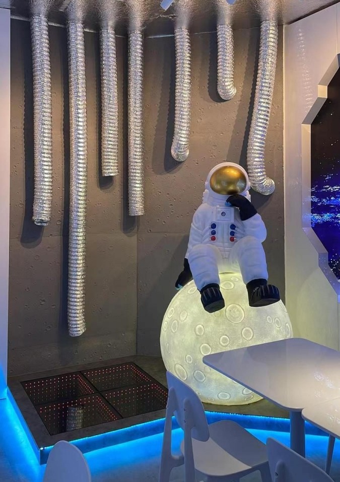 Astronaut photo spot at outer space-themed restaurant Chef China 华厨 Hua Chu in Singapore