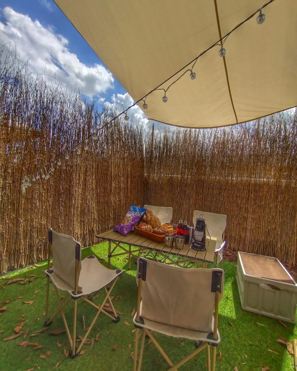 Camping themed photo area at Parallel Egos Studios