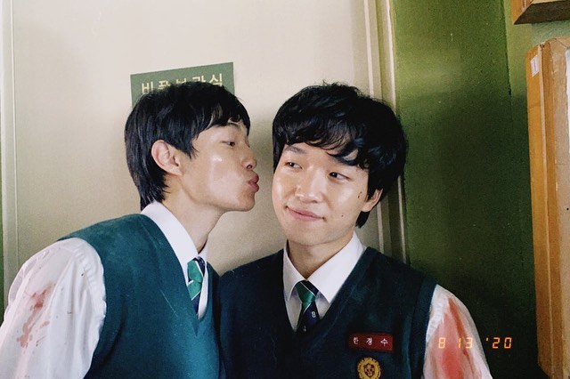 Yoon chanyoung kissing Ham Sungmin on the cheek behind the scenes of All of Us Are Dead zombie netflix series