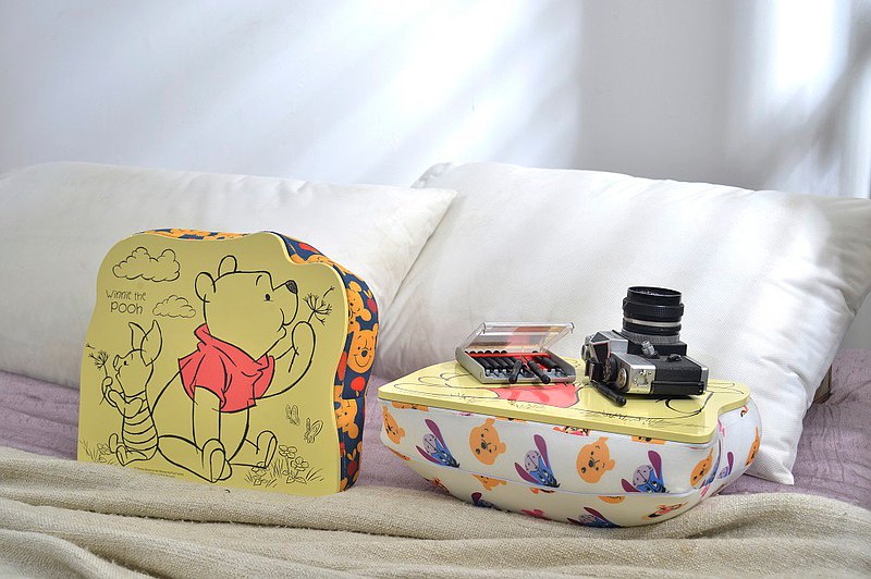 Winnie-the-Pooh multifunctional pillow used as a table