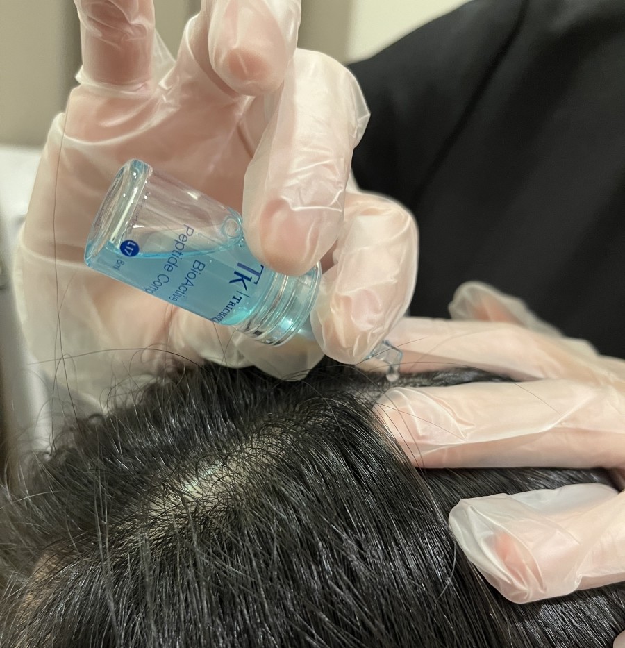 An ampoule is then added to encourage healthy hair growth. 