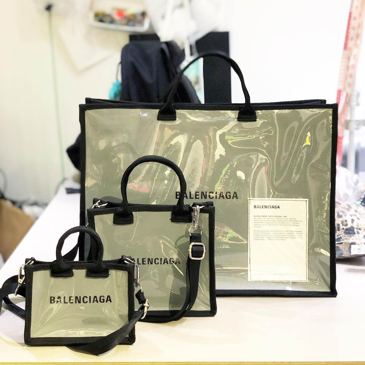 Upcycled handbags from Balenciaga paper bags by KLONE