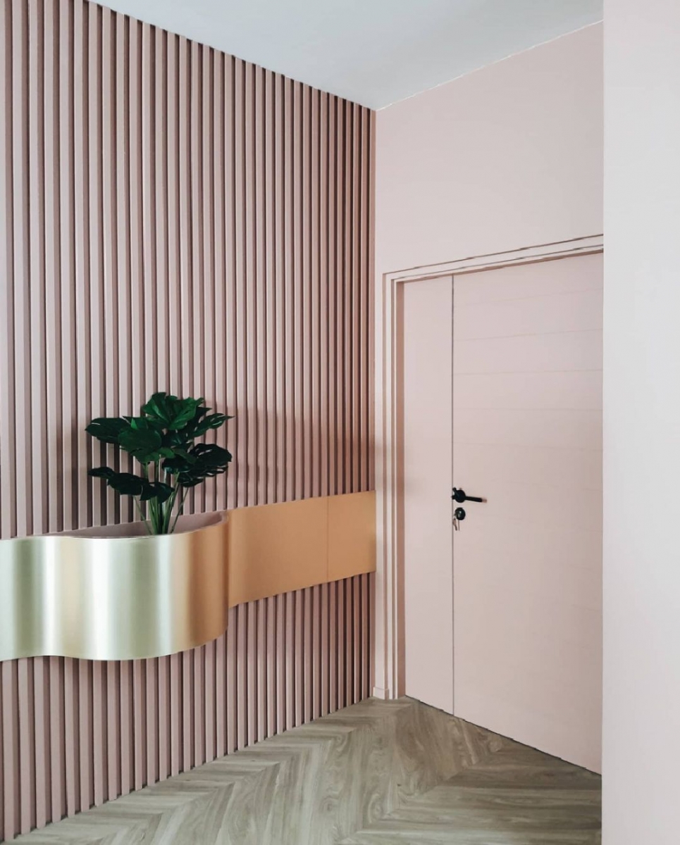 Pink entryway of an Insta-worthy cafe-themed home in Bangkok, Thailand