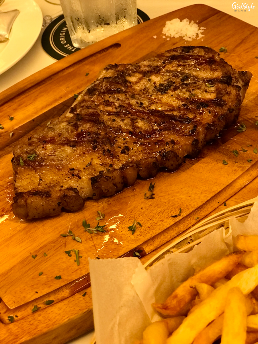 Grilled Canadian Pork Chop - Les Bouchons at Rochester Commons