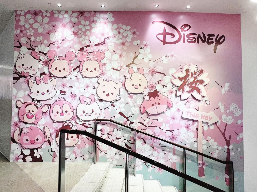 Goldwood sakura-themed Disney stairway decor at Suntec City