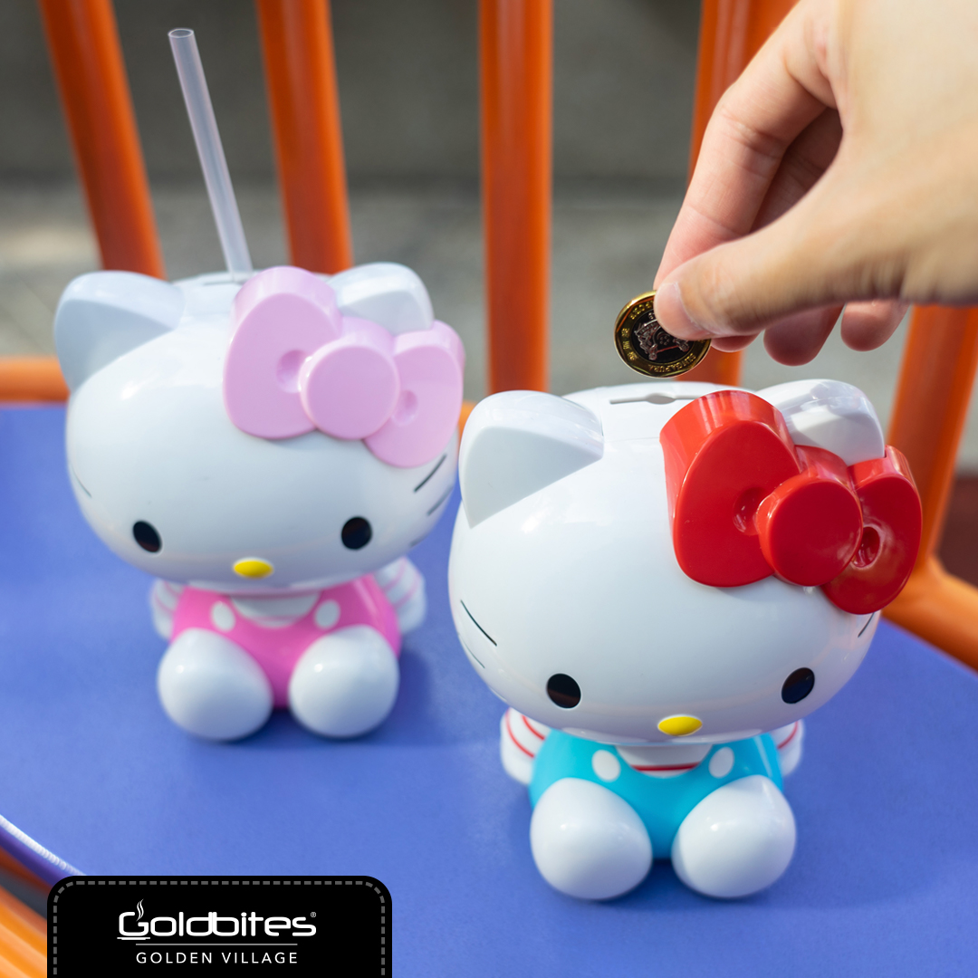Golden Village Hello Kitty Tumbler used as a coin bank