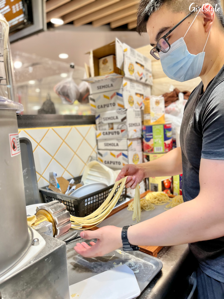 Chef making fresh pasta at Pastago JCube
