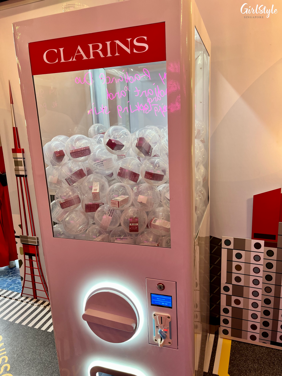 Gashapon machine - Clarins In The City pop-up beauty trailer at Paya Lebar Quarter