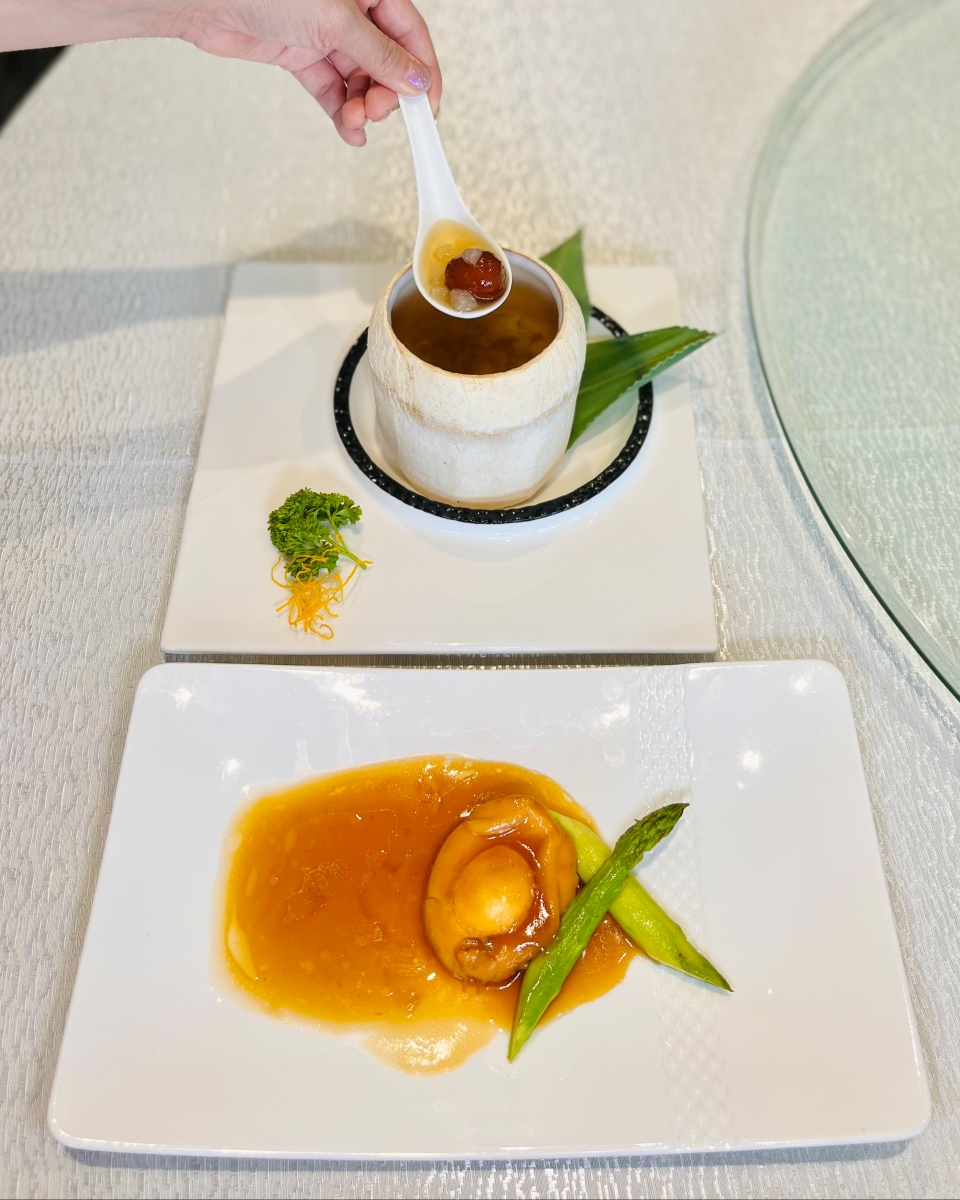 From the top: Double-boiled Hasma in Young Coconut and Braised Australian 3-head Abalone accompanied with Asparagus. 