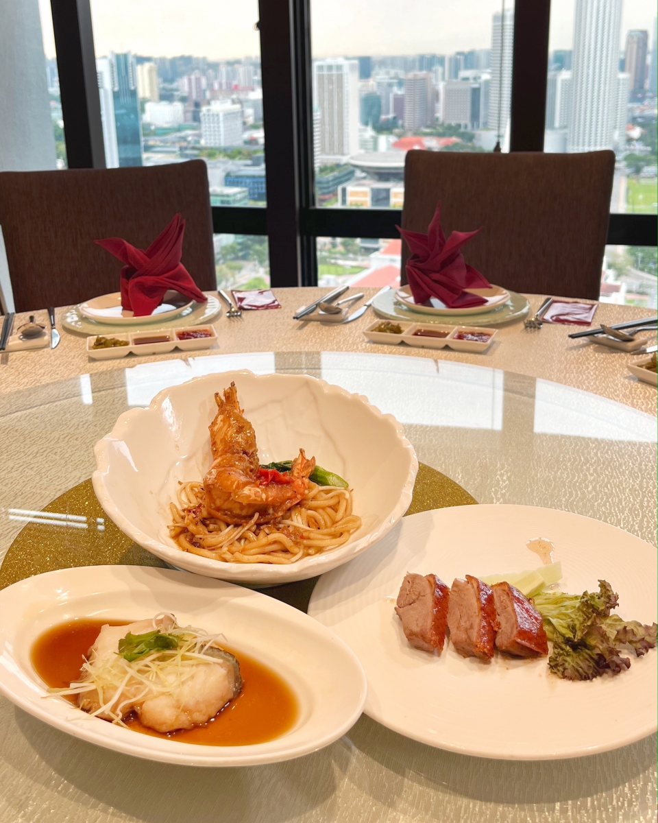 Clockwise, from the top: Stewed Fish Paste Noodle with Tiger Prawn in X.O. Sauce, Roasted London Duck with Chef’s Special Sauce, Steamed Fillet of Dragon Tiger Garoupa with Mui Choy in Shallot Oil, all from the $88 set menu. 