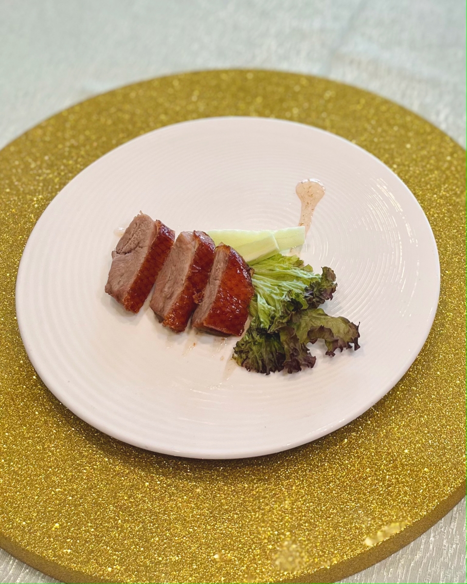 Roasted London Duck with Chef’s Special Sauce. 