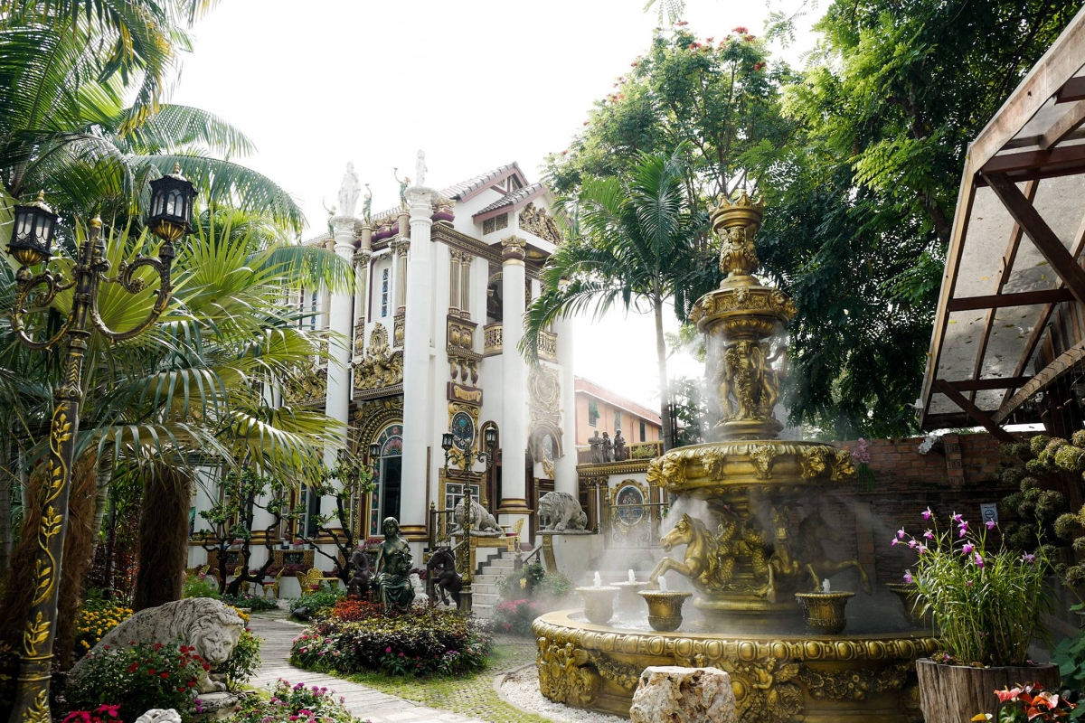 Versailles de Flore cafe castle-like exterior with fountain