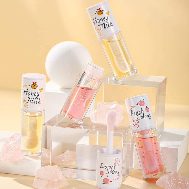 OKANEN Peach Oolong Honey Milk Lip Oil in Singapore