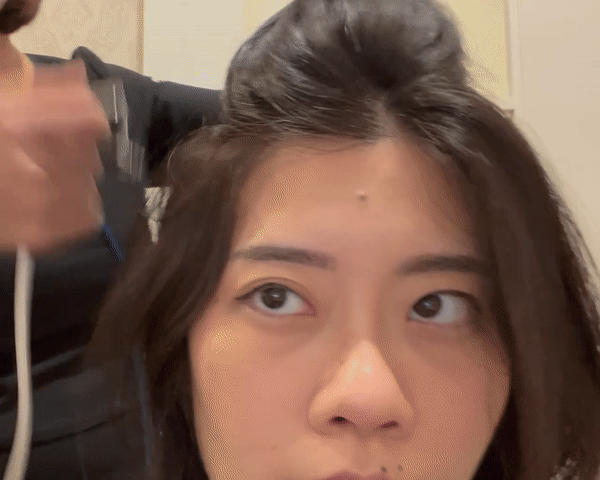 Misting my scalp with an anti-fungal and antibacterial treatment to prevent dandruff. 