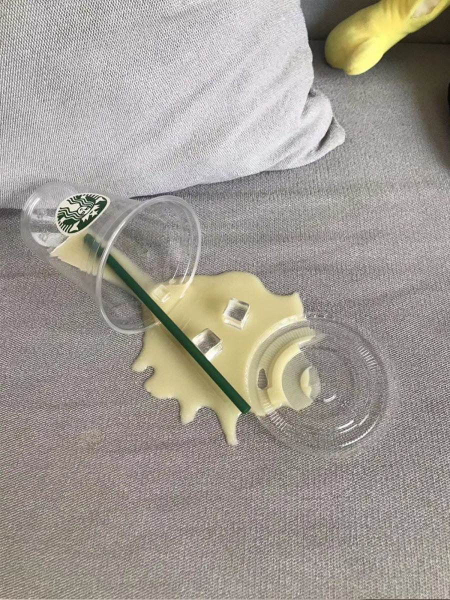 Starbucks-inspired spilled drink phone holder