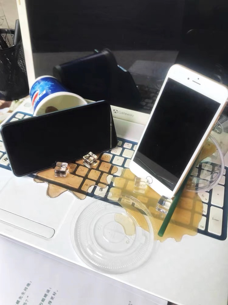 Spilled drink phone holders