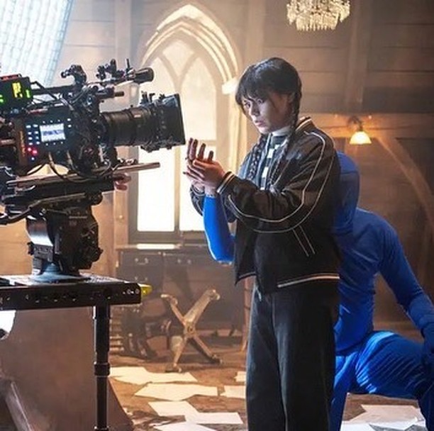 Wednesday Netflix behind the scenes with Victor Dorobantu as Thing