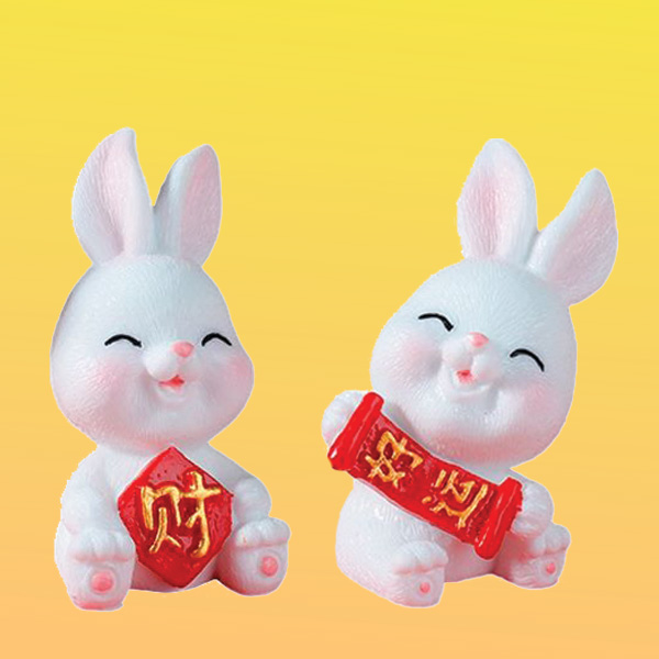 A pair of rabbit figurines