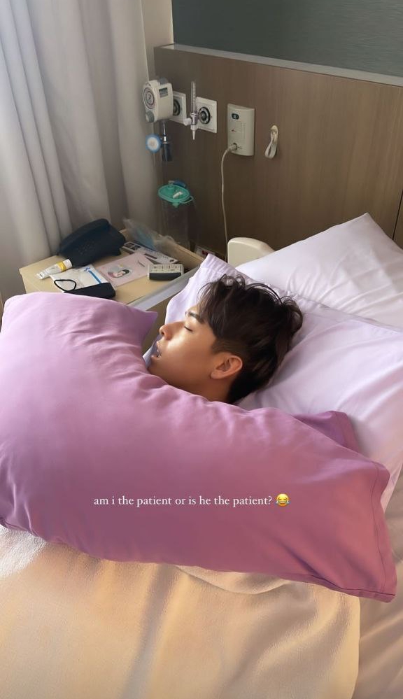 Titus Low sleeping in Cheryl Chin's maternity ward