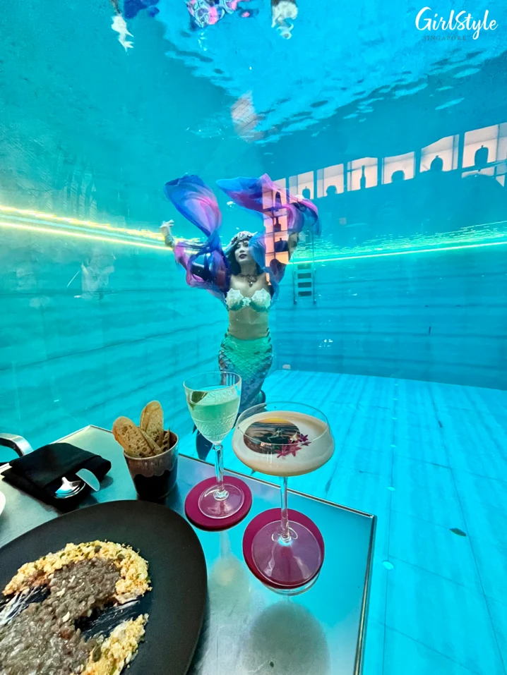 Dine with a mermaid at Fish Pool at The NCO Club Singapore