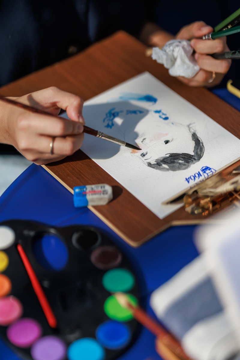 Hand-drawn portraits at the Rue 1664 pop-up at Mandarin Gallery