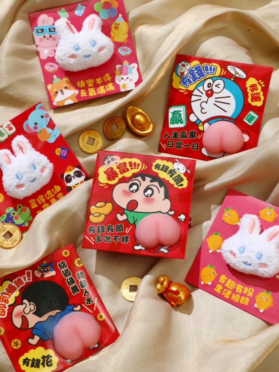 Red packets with 3D butt details ft. Crayon Shin-Chan, Doraemon and rabbits