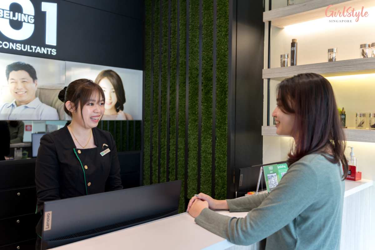 Booking my next appointment after thanking the hair specialist