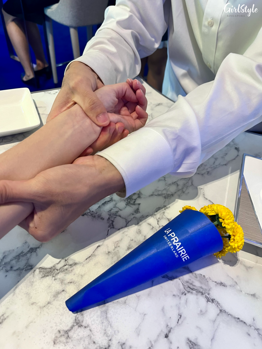Complimentary hand massage using La Prairie skincare products