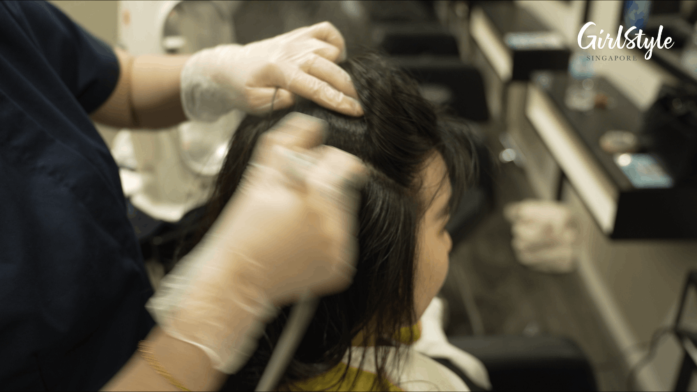 The NanoMist Spray applies a Customized Treatment Essence onto my scalp