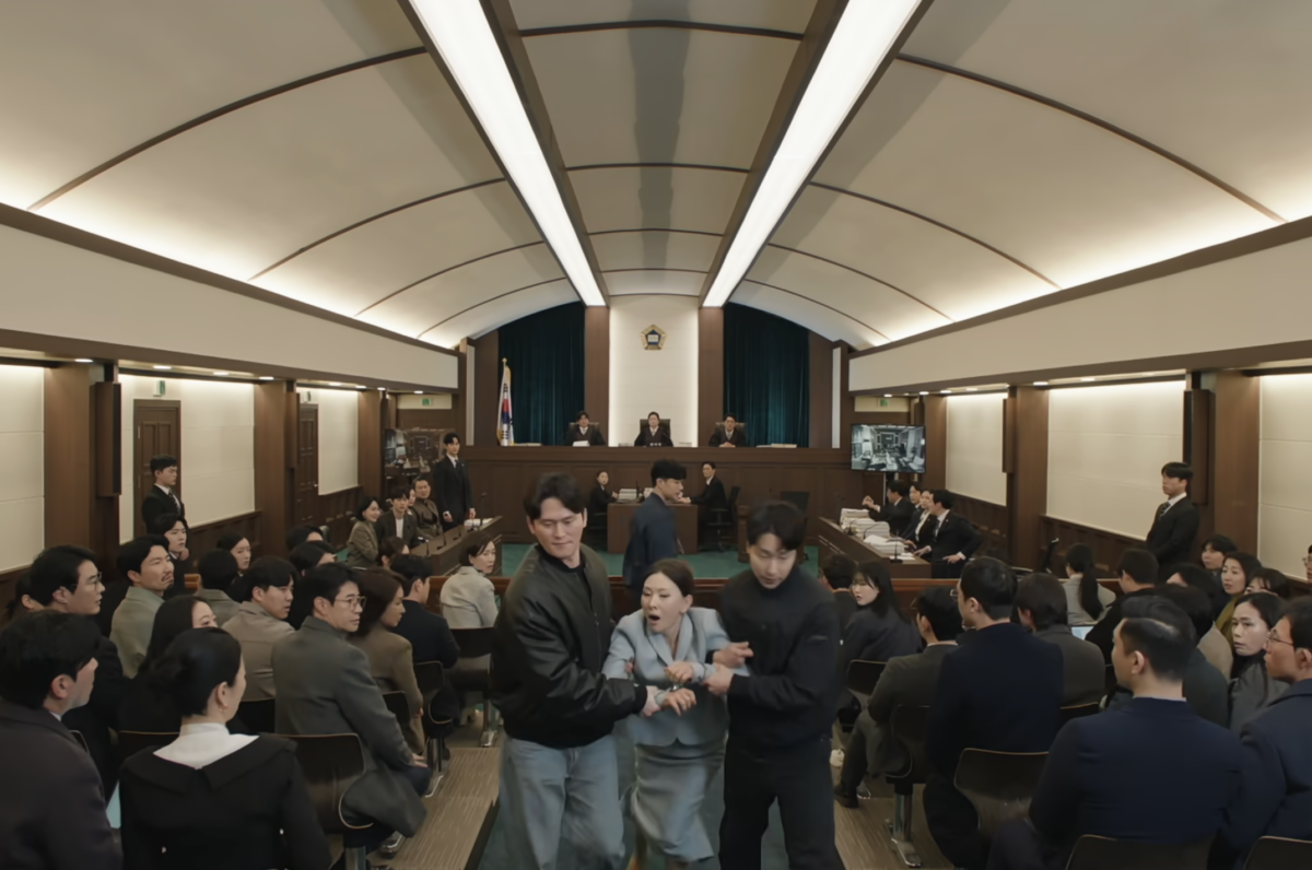 Lee Mi-sook's character, Seul-hee being dragged by policemen in Episode 16