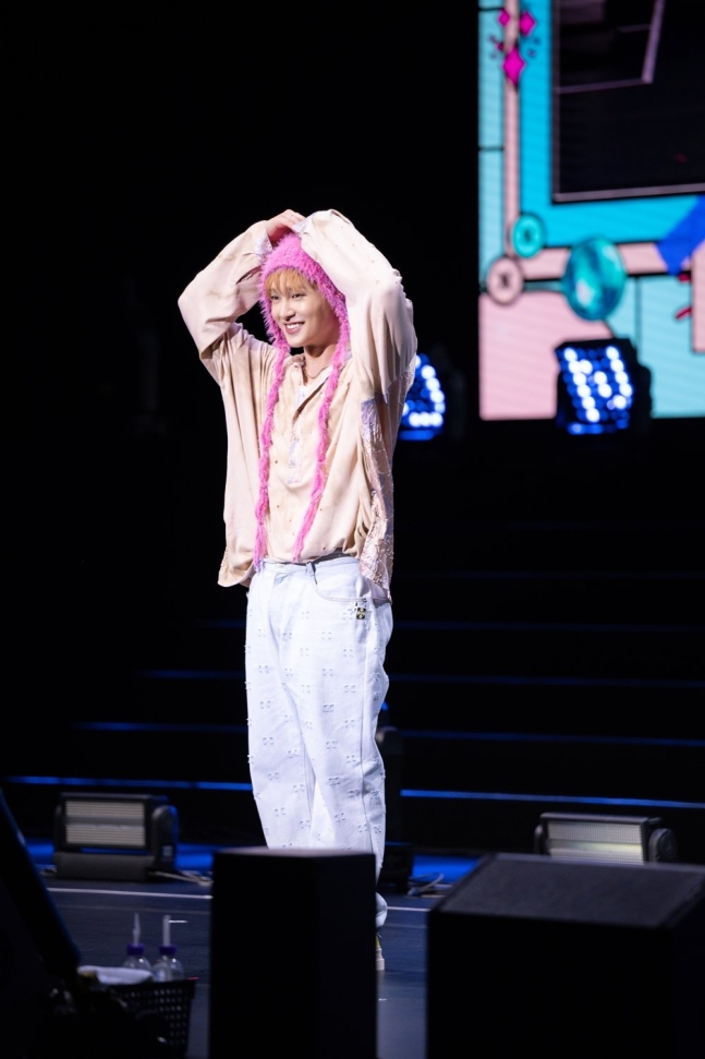 Onew at the GUESS! fan meeting in Singapore on 21 July 2024