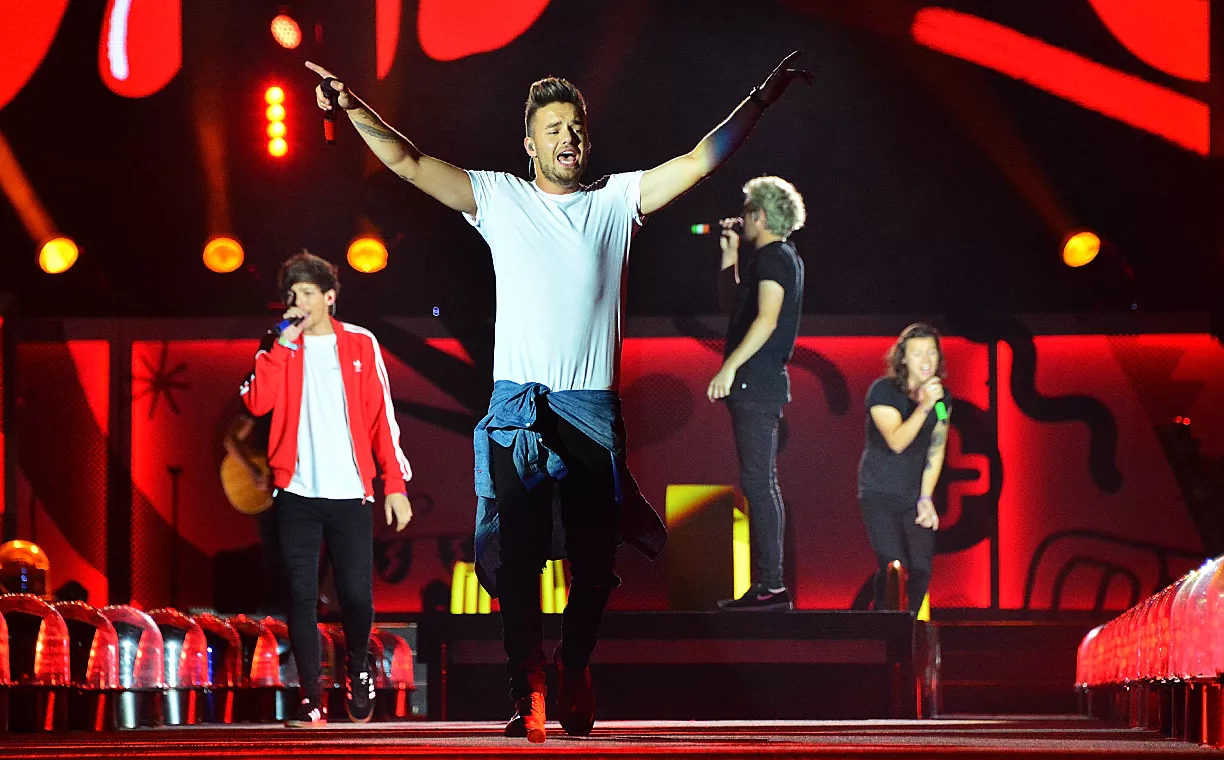 Liam Payne and his bandmates performing at MetLife Stadium in 2015