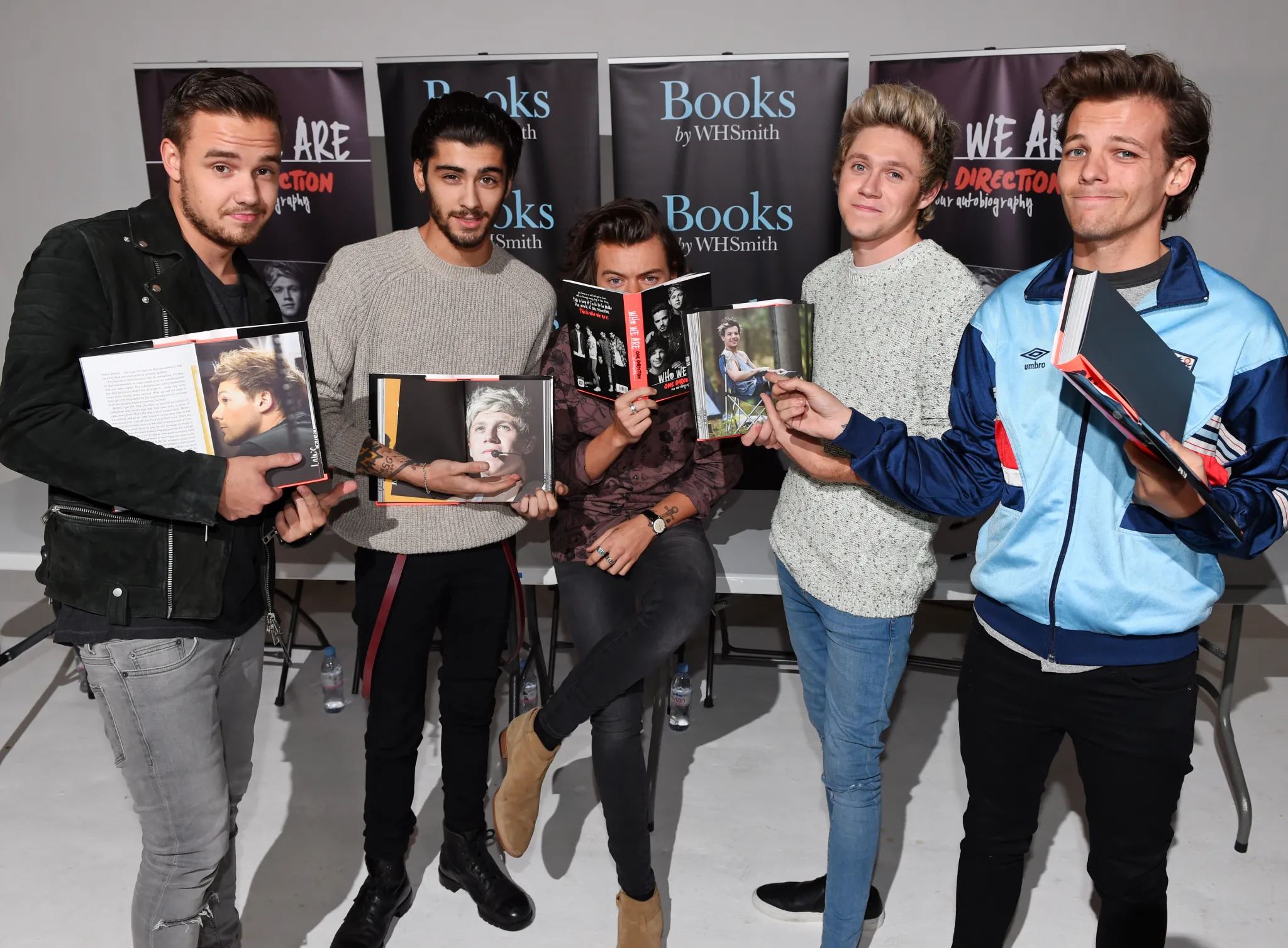 Liam Payne, Zayn Malik, Harry Styles, Niall Horan, and Louis Tomlinson at the ‘One Direction: Who We Are’ autobiography book signing in London in 2014
