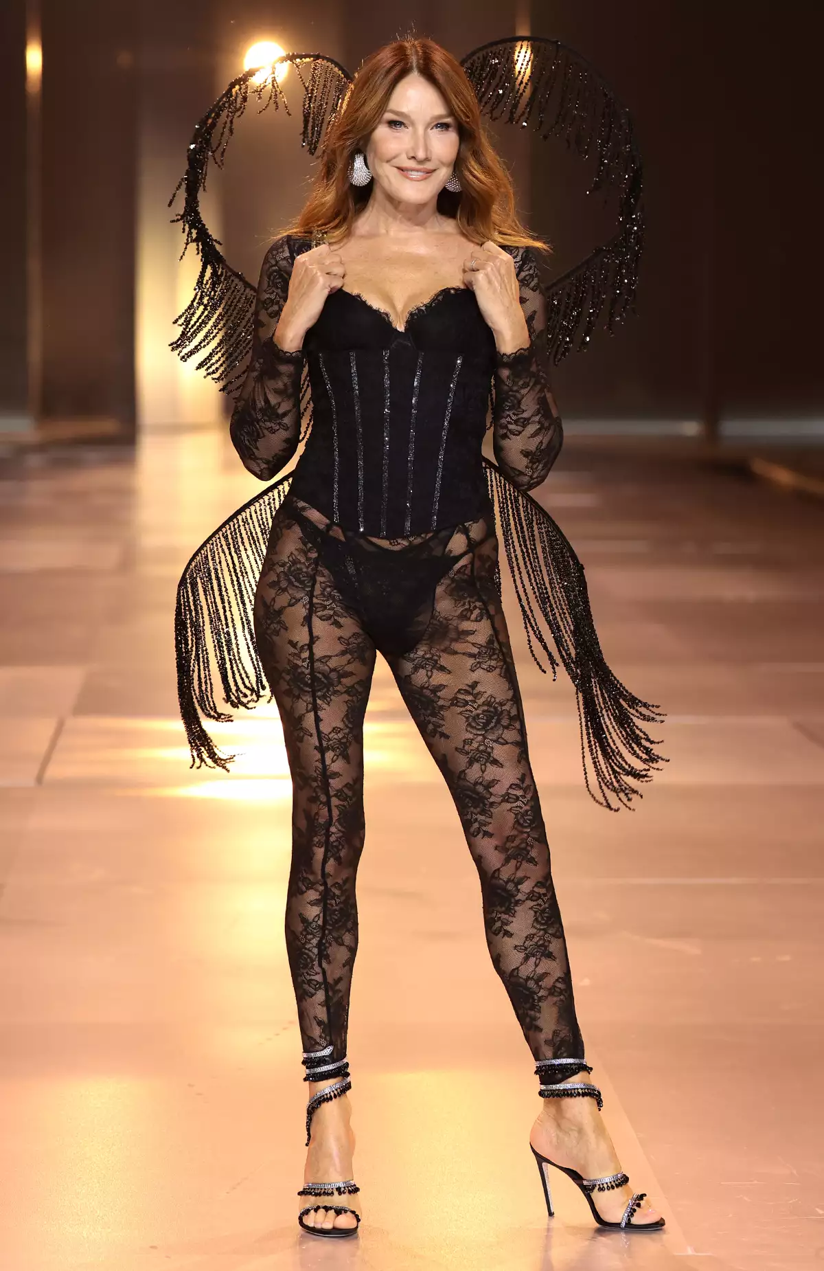 Carla Bruni walks the runway during Victoria's Secret Fashion Show 2024