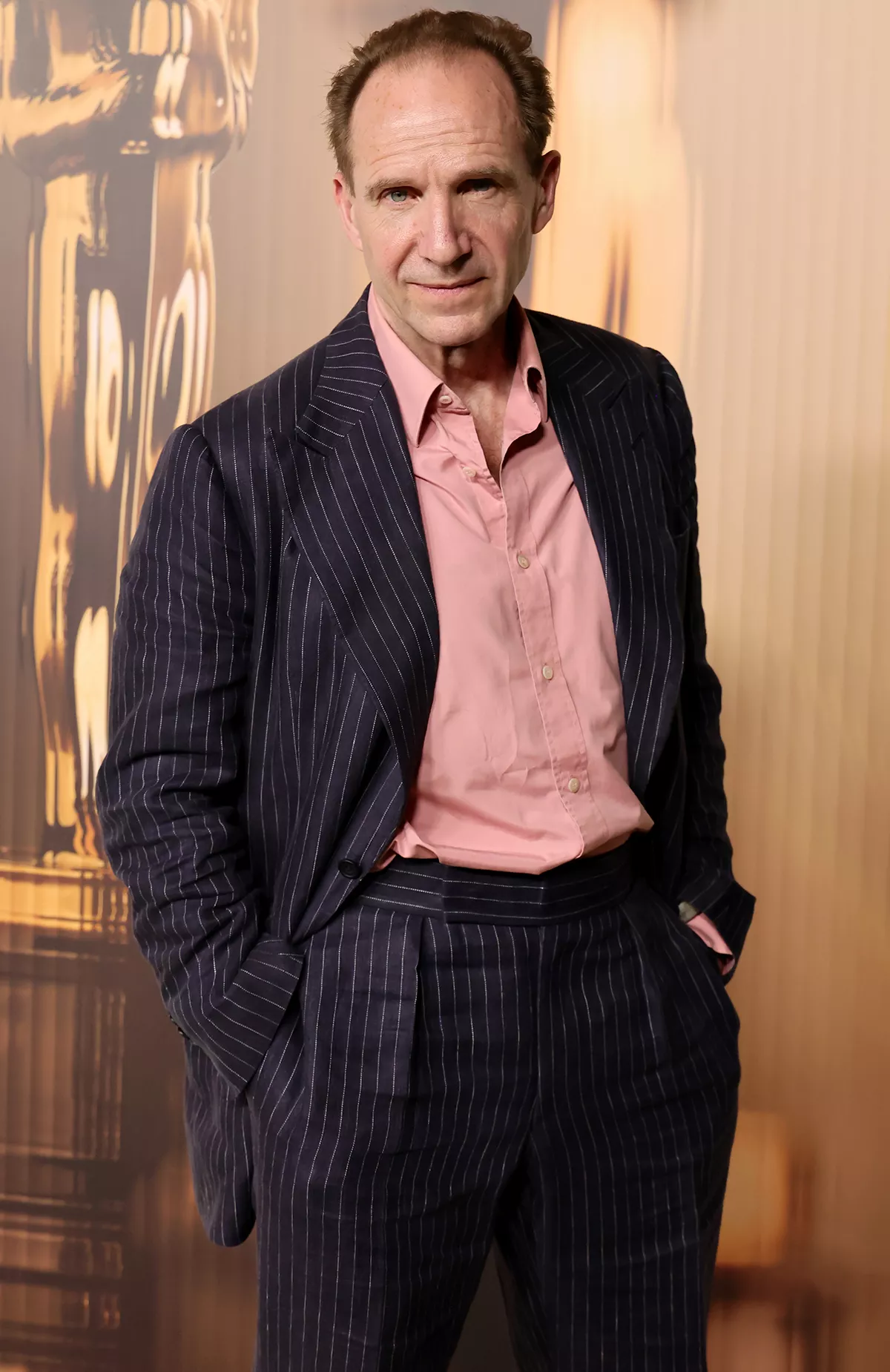 Ralph Fiennes as President Coriolanus Snow