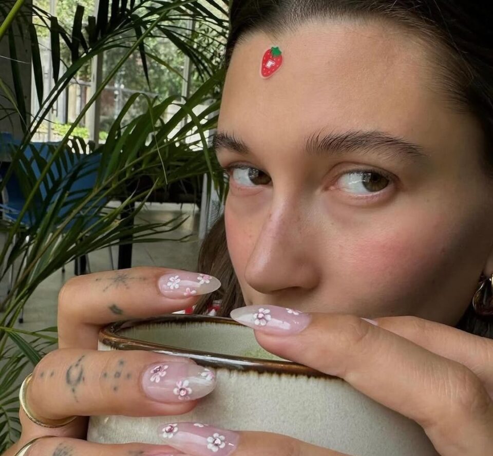 Hailey Bieber wearing rhode pimple patches