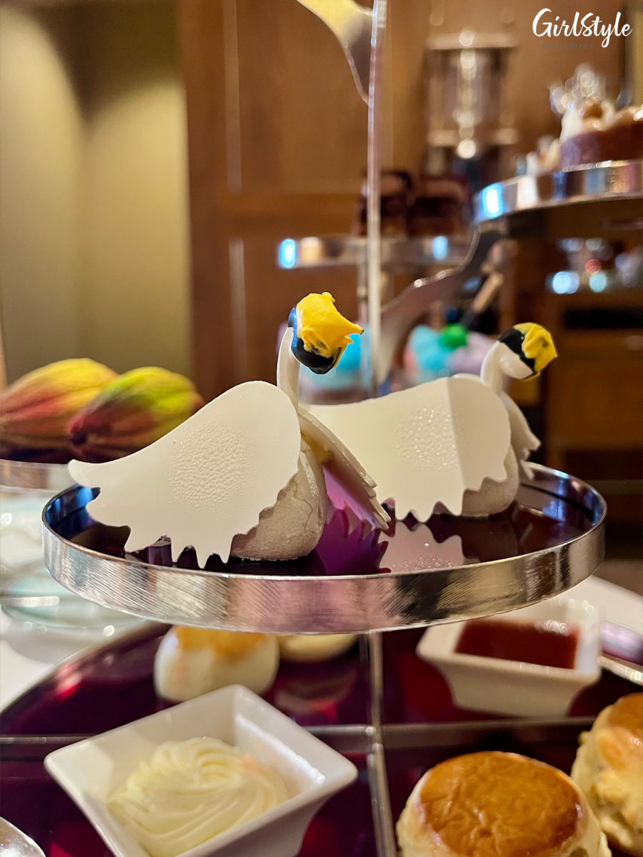 Swan-shaped Mille-Feuille of hazelnut dacquoise, Komuntu crémeux, Caraïbe whip, and Manjari chocolate