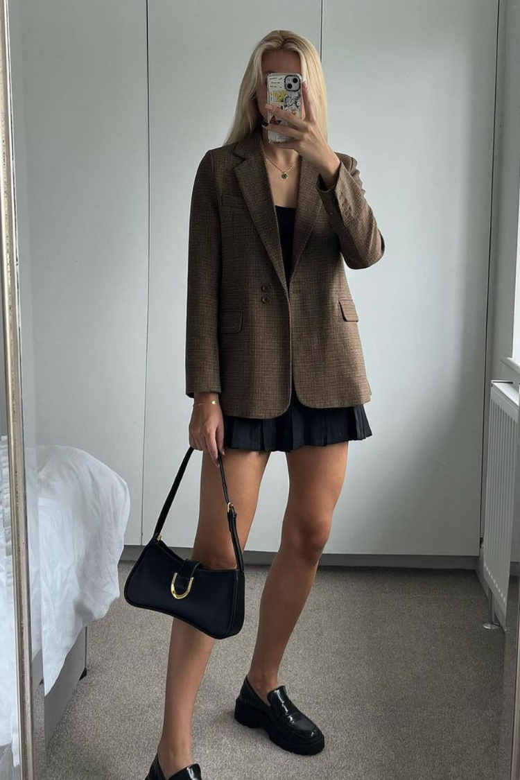 Match your tennis skirt with a blazer and heels or loafers for an elevated, polished, classy style