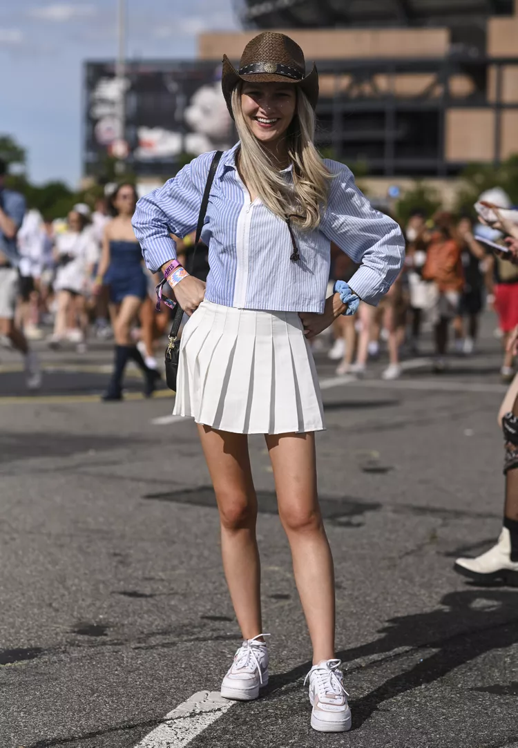 Balance casual and formal by pairing your tennis skirt with a cropped long sleeve collared shirt