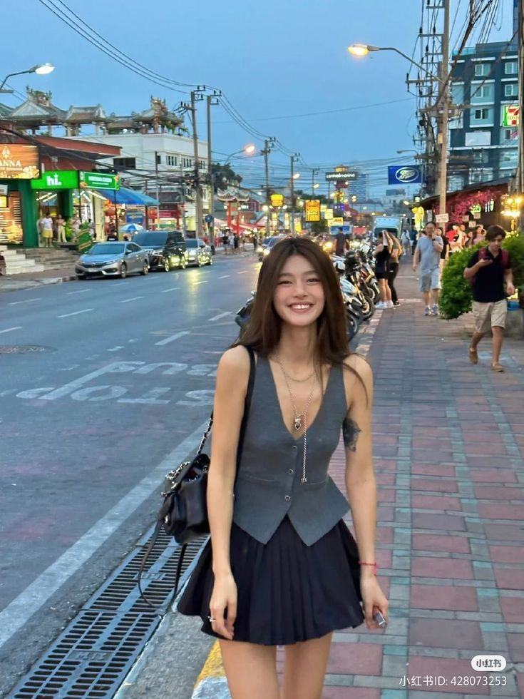 Pair a tennis skirt with a cute vest top for a playful, casual yet chic everyday look