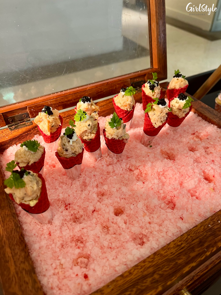 Smoked Salmon Tartare with Crème Fraiche and Black Caviar in a Pink Con